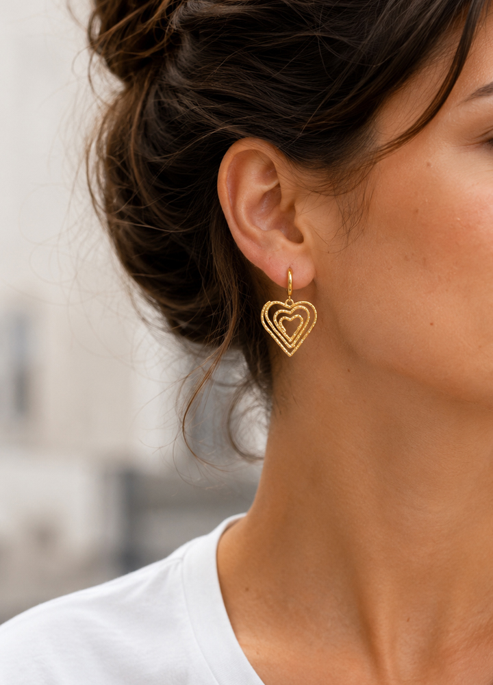 Boucle d'oreille Amo dorée